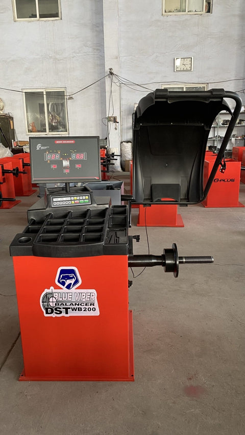NEW DELUXE WHEEL TIRE BALANCER WB200A - with | Sold by Uncle Wiener's Wholesale