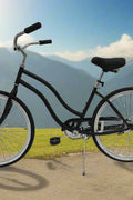 Side view of Deviant 26" beach cruiser bicycle in matte black

Close-up of comfort seat and handlebar grips

Rear coaster brake and single-speed drivetrain

Full assembled view of the Deviant black cruiser bike

Cruiser bike parked on a path at sunset