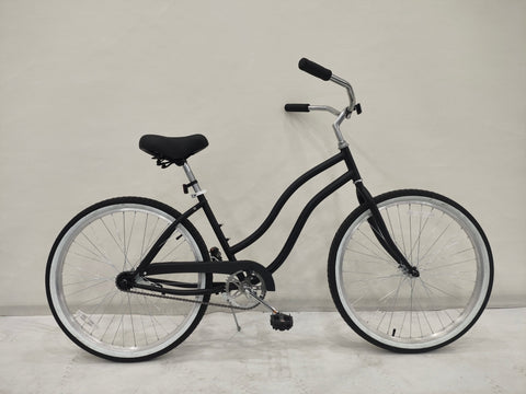 Side view of Deviant 26" beach cruiser bicycle in matte black

Close-up of comfort seat and handlebar grips

Rear coaster brake and single-speed drivetrain

Full assembled view of the Deviant black cruiser bike

Cruiser bike parked on a path at sunset