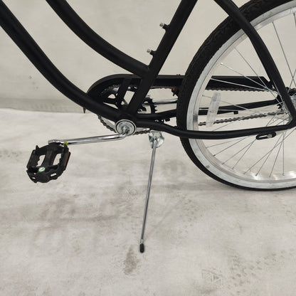 Side view of Deviant 26" beach cruiser bicycle in matte black

Close-up of comfort seat and handlebar grips

Rear coaster brake and single-speed drivetrain

Full assembled view of the Deviant black cruiser bike

Cruiser bike parked on a path at sunset