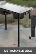 Double burner flat top propane griddle with folding legs
Stainless steel outdoor grill for camping and BBQ
Side view of portable propane camp stove with handles
32x17 inch flat top grill cooking surface