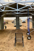 Double steel garage with roll-up doors, outdoor view

Interior view of metal garage barn frame

Roll-up electric overhead doors included in garage

Galvanized steel shed for vehicle and farm storage

Multiple-size all-weather garage options