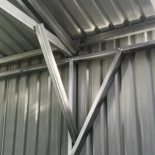 Double steel garage with roll-up doors, outdoor view

Interior view of metal garage barn frame

Roll-up electric overhead doors included in garage

Galvanized steel shed for vehicle and farm storage

Multiple-size all-weather garage options