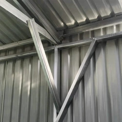 Double steel garage with roll-up doors, outdoor view

Interior view of metal garage barn frame

Roll-up electric overhead doors included in garage

Galvanized steel shed for vehicle and farm storage

Multiple-size all-weather garage options
