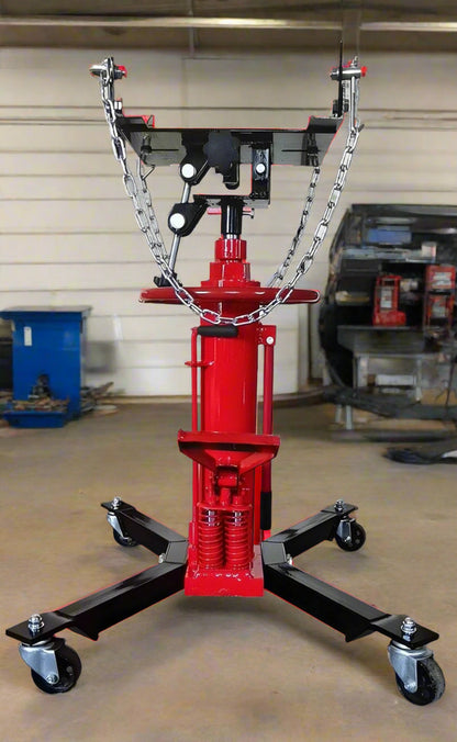 "Double piston 2-stage hydraulic transmission jack with red steel frame"

"1320 lb telescopic transmission lift jack for vehicle maintenance"

"Heavy-duty transmission jack with foot pump and swivel casters"