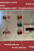Control panel showing heat, timer, and oil level settings for donut fryer.
Electrical connector and power input label for commercial donut machine (110V, 3KW)