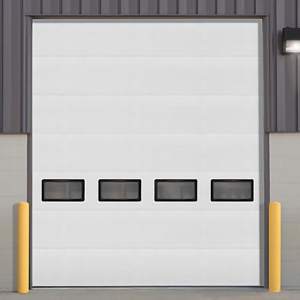 White insulated electric overhead garage door installed in shop
Heavy-duty motorized overhead garage door with steel frame
Electric garage door kit with insulation for industrial buildings
Overhead sectional garage door installed on warehouse