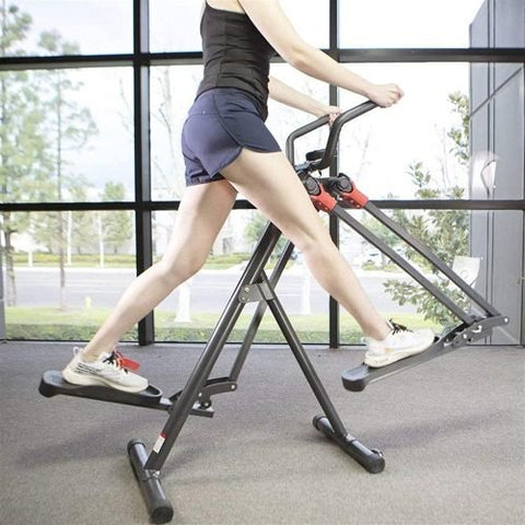 Foldable elliptical trainer machine – front view

Compact home elliptical with ergonomic foot pedals

Indoor elliptical fitness machine for low-impact workouts

Folded elliptical – easy storage design

Woman using elliptical trainer at home