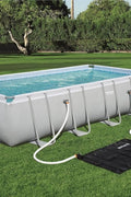 Solar Pool Heater Panel – Laid Flat for Installation
Pool Heating Mat – Compatible with Above Ground Pools
Solar Heating Panel Connected to Pool System
Eco-Friendly Pool Water Heater – Black UV Mat
Pool Setup with Solar Panel Heater in Sunlight