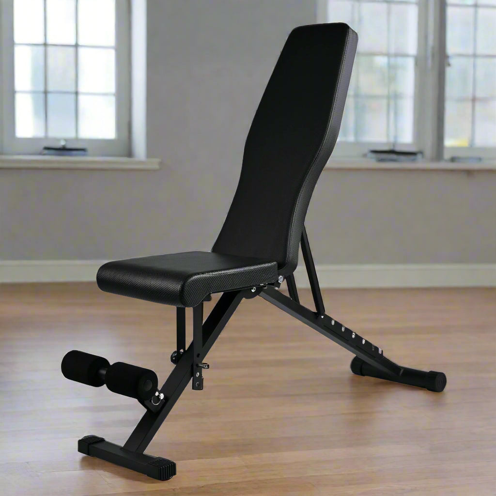 Adjustable weight bench with dumbbells – full side view

Foldable black workout bench shown folded for compact storage

7-position incline backrest setting demonstration

Bench in use for upper body exercises

Heavy-duty steel frame with 400 lb weight capacity