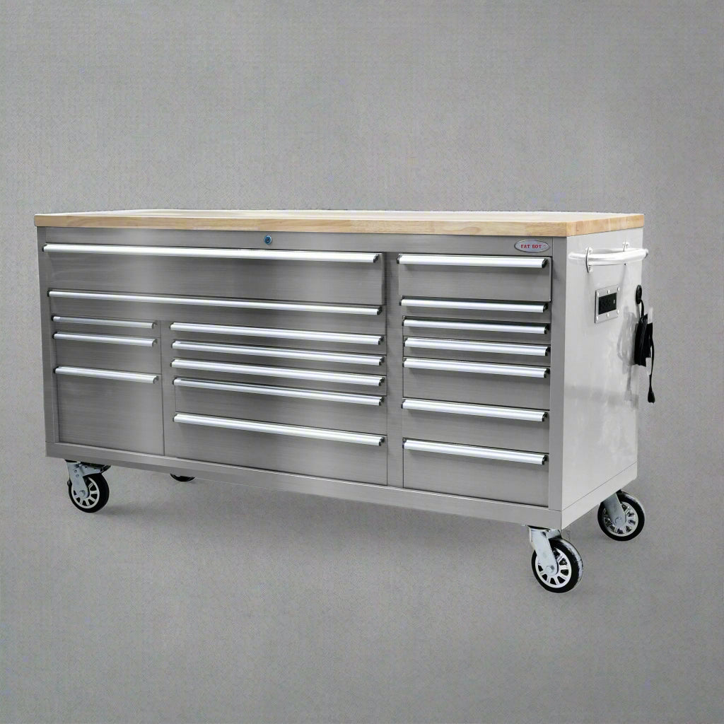 Fatboy 72" tool bench in JD Green finish with drawers closed

Open drawer view of Fatboy Xtra Wide Tool Box

Roller tool cabinet in stainless steel with heavy-duty casters

Fatboy workbench power bar and USB charging detail