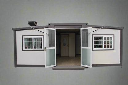 "Foldable insulated container home with windows and door – 19FT model"

"Portable prefab tiny home cabin for off-grid living and remote offices"

"Modular container house interior layout – white insulated walls and windows"