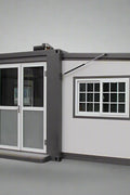 "Foldable insulated container home with windows and door – 19FT model"

"Portable prefab tiny home cabin for off-grid living and remote offices"

"Modular container house interior layout – white insulated walls and windows"