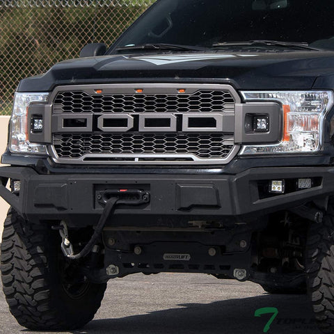 Front view of Ford F-150 with Raptor style grille installed
Close-up of honeycomb mesh design
Back of grill with wiring harness
LED light bars and connectors
Grill with lights turned on