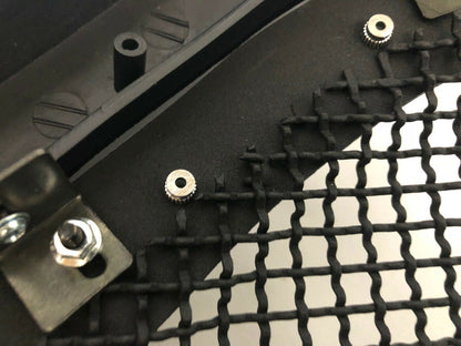 Black rivet mesh grille installed on Ford F-250
Side view of FDGRL48 grille finish and build
Close-up of stainless steel mesh and rivets
Black powder-coated grille laid flat
Packaging and grille kit contents