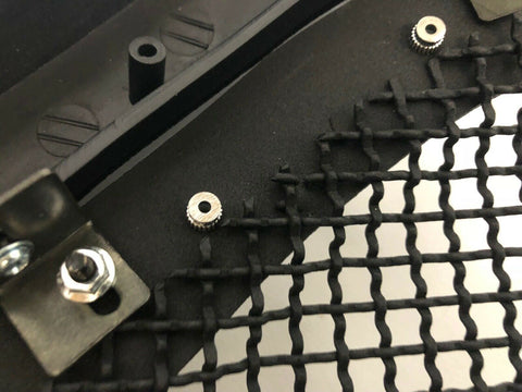 Black rivet mesh grille installed on Ford F-250
Side view of FDGRL48 grille finish and build
Close-up of stainless steel mesh and rivets
Black powder-coated grille laid flat
Packaging and grille kit contents