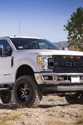 Installed front grille on F-250 (front view)
LED lights illuminated on grille
Full grille kit with components displayed
Side angle showcasing grille on truck
Top-down view of grille material and mesh
Before and after install comparison
Close-up of amber LED bar in grille