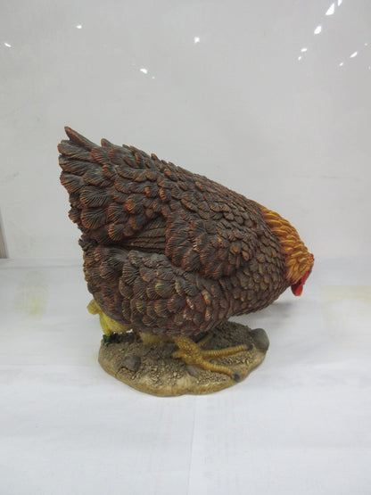 Realistic resin chicken and chicks statue on outdoor display
Close-up of hand-painted hen and baby chicks sculpture
Weather-resistant garden chicken ornament
Farmhouse-style chicken décor for patio or garden
Lifelike hen with chicks resin statue for outdoor and indoor use