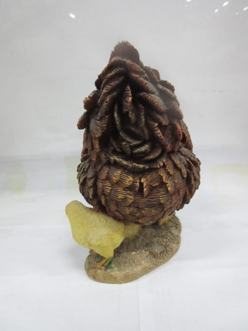 Realistic resin chicken and chicks statue on outdoor display
Close-up of hand-painted hen and baby chicks sculpture
Weather-resistant garden chicken ornament
Farmhouse-style chicken décor for patio or garden
Lifelike hen with chicks resin statue for outdoor and indoor use