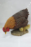 Realistic resin chicken and chicks statue on outdoor display
Close-up of hand-painted hen and baby chicks sculpture
Weather-resistant garden chicken ornament
Farmhouse-style chicken décor for patio or garden
Lifelike hen with chicks resin statue for outdoor and indoor use