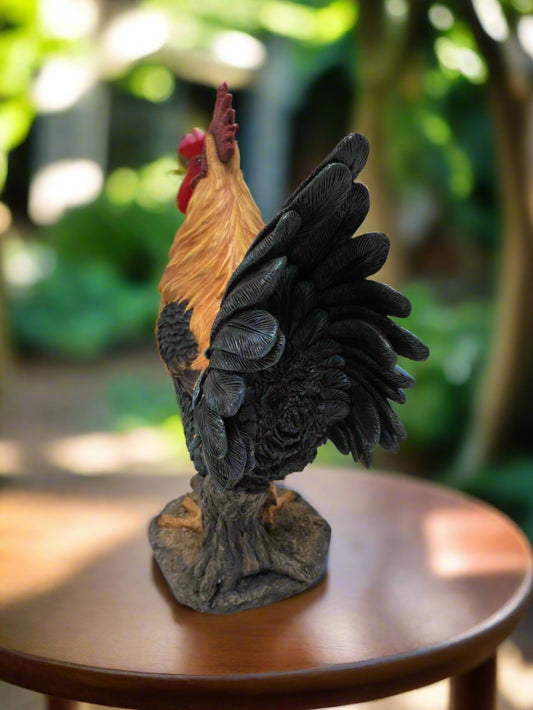 Close-up of tail feathers and sturdy base on rooster sculpture