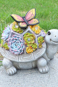 Solar turtle garden statue with LED lights and succulents
Whimsical outdoor turtle figurine with butterfly light
Resin turtle statue with solar-powered garden lighting