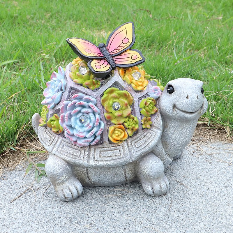 Solar turtle garden statue with LED lights and succulents
Whimsical outdoor turtle figurine with butterfly light
Resin turtle statue with solar-powered garden lighting