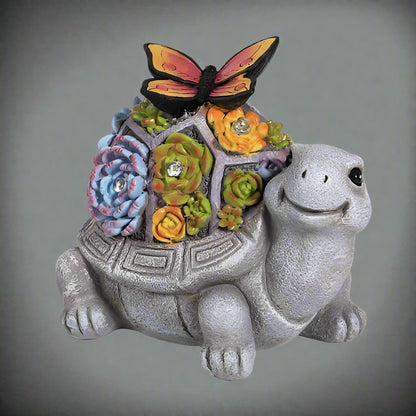 Solar turtle garden statue with LED lights and succulents
Whimsical outdoor turtle figurine with butterfly light
Resin turtle statue with solar-powered garden lighting