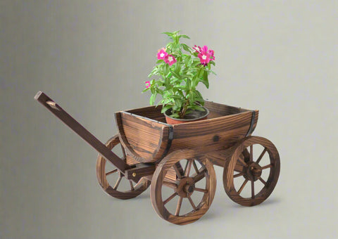 "Rustic wagon wheel planter with burnt wood finish"

"Half barrel garden planter with iron wheels"

"Country-style wooden flower pot for patios and balconies"

"Vintage decorative garden barrel planter WWP43"