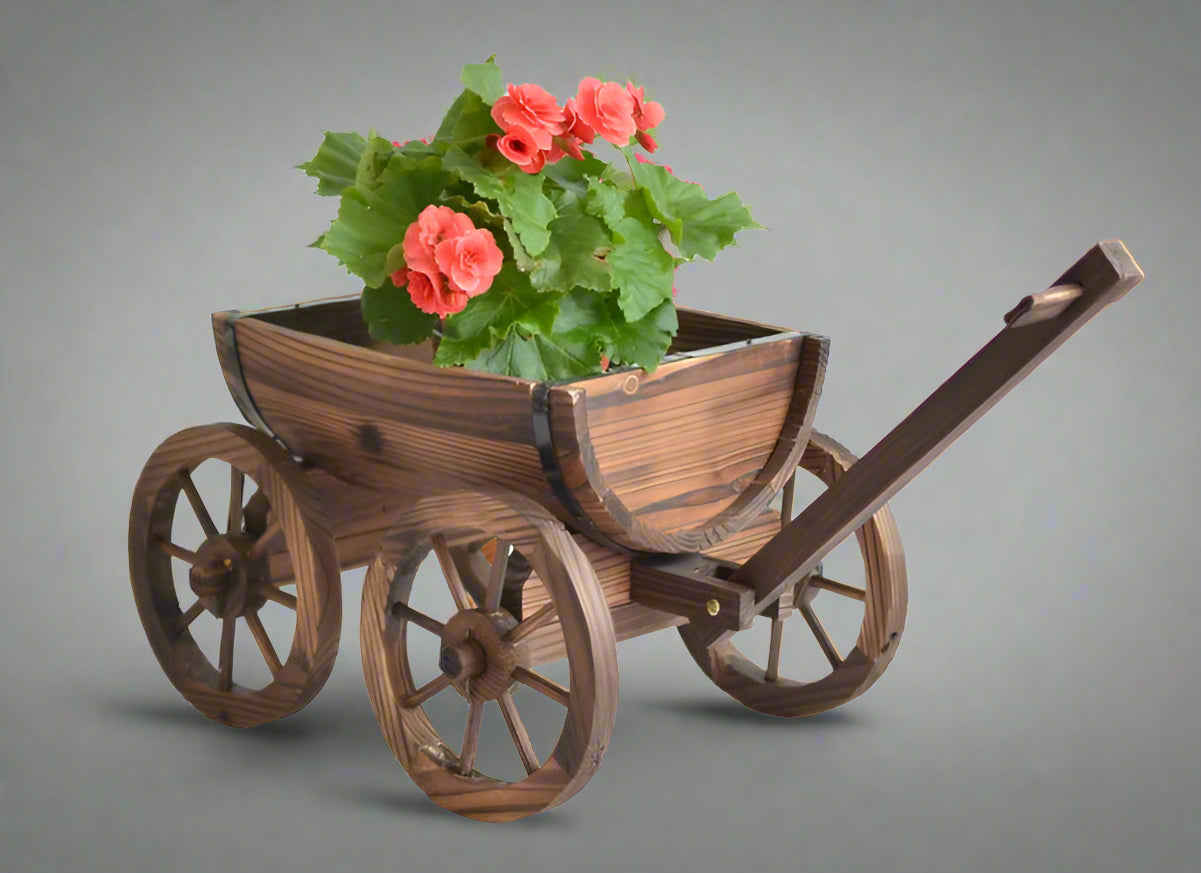 "Rustic wagon wheel planter with burnt wood finish"

"Half barrel garden planter with iron wheels"

"Country-style wooden flower pot for patios and balconies"

"Vintage decorative garden barrel planter WWP43"