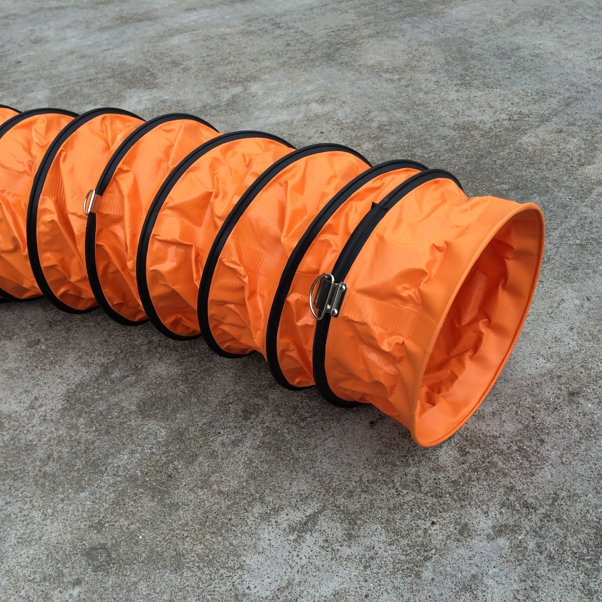 Collapsible portable air duct hose with fire-retardant construction