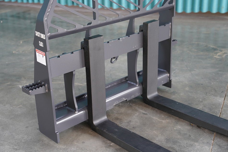 Class 3 skid steer forks and frame attachment rated for 12,000 lb
Heavy-duty 48-inch steel pallet forks with universal frame
Industrial skid steer fork combo for material handling
Rugged Class 3A steel forks on wide frame