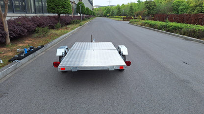 Heavy-duty galvanized 4x8 folding utility trailer with checker plate deck and road-ready tires