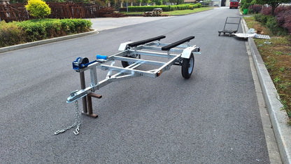 Heavy-duty galvanized 4x8 folding utility trailer with checker plate deck and road-ready tires
