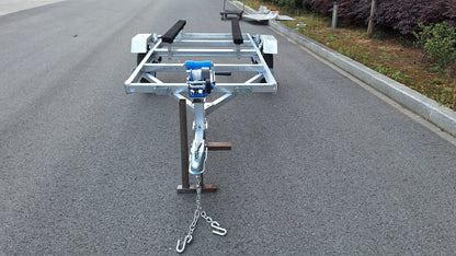 Heavy-duty galvanized 4x8 folding utility trailer with checker plate deck and road-ready tires
