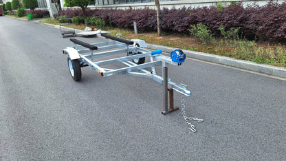 Heavy-duty galvanized 4x8 folding utility trailer with checker plate deck and road-ready tires