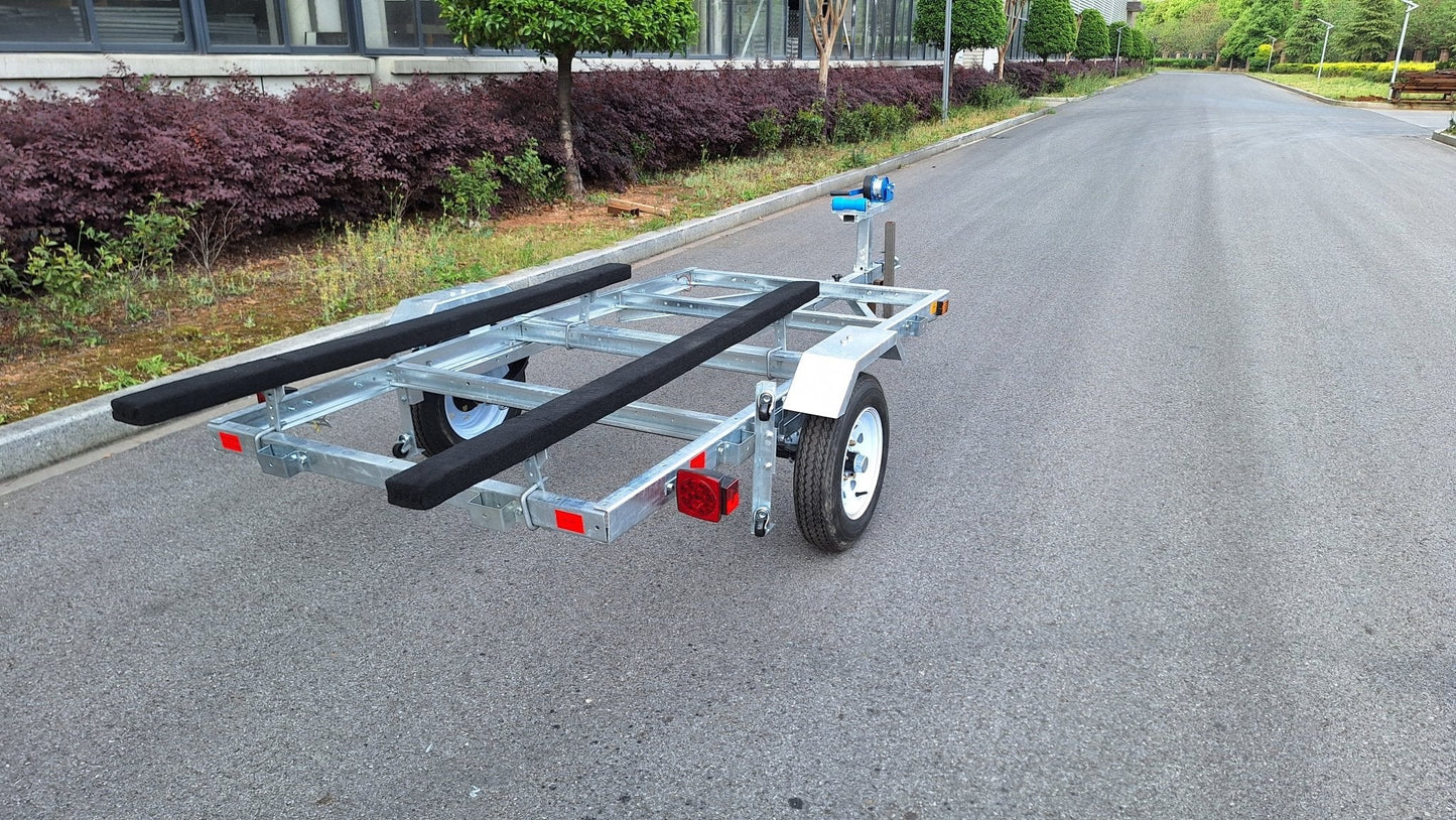 Heavy-duty galvanized 4x8 folding utility trailer with checker plate deck and road-ready tires