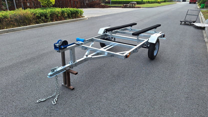 Heavy-duty galvanized 4x8 folding utility trailer with checker plate deck and road-ready tires