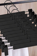 10-pack heavy-duty black clip hangers for pants and skirts
Non-slip vinyl clip steel hangers with swivel hooks
Durable trouser hangers space-saving design black color