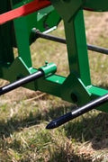 John Deere Quick Attach Bale Spear with 49-inch spear
Heavy-duty green hay fork with stabilizer spears
Tractor bale spear TH51240 for John Deere hook & pin systems