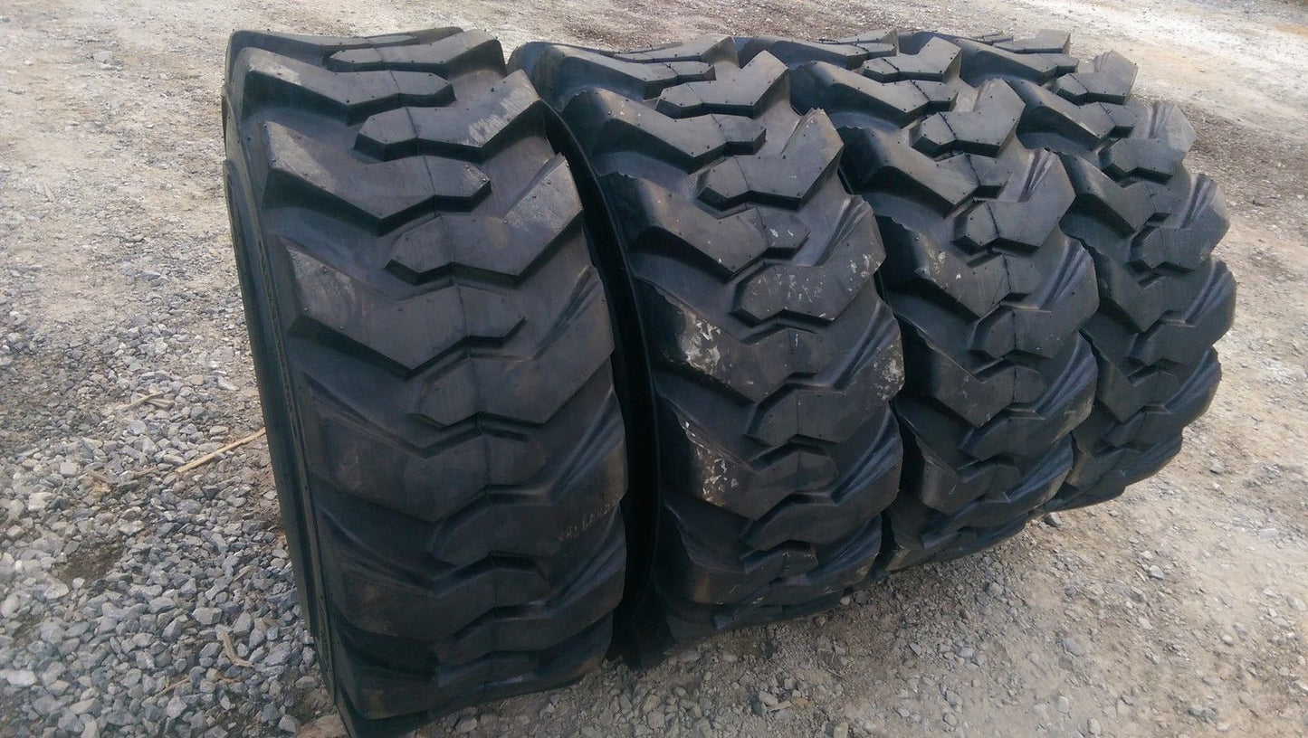 “Heavy duty skid steer tires with aggressive tread”

“SKS-1 and SKS-4 tires for Bobcat A300 and S750”

“Skid steer tires with red and silver rims”

“10x16.5 to 15x19.5 skid steer tire variants”

“Close-up of durable construction skid steer tire”

