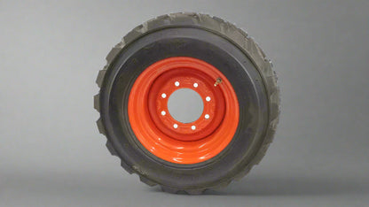 “Heavy duty skid steer tires with aggressive tread”

“SKS-1 and SKS-4 tires for Bobcat A300 and S750”

“Skid steer tires with red and silver rims”

“10x16.5 to 15x19.5 skid steer tire variants”

“Close-up of durable construction skid steer tire”

