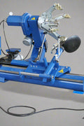 Heavy-duty electro-hydraulic truck tire changer – Model H8910 side view
H8910 tire changer with control console and hydraulic arm for trucks