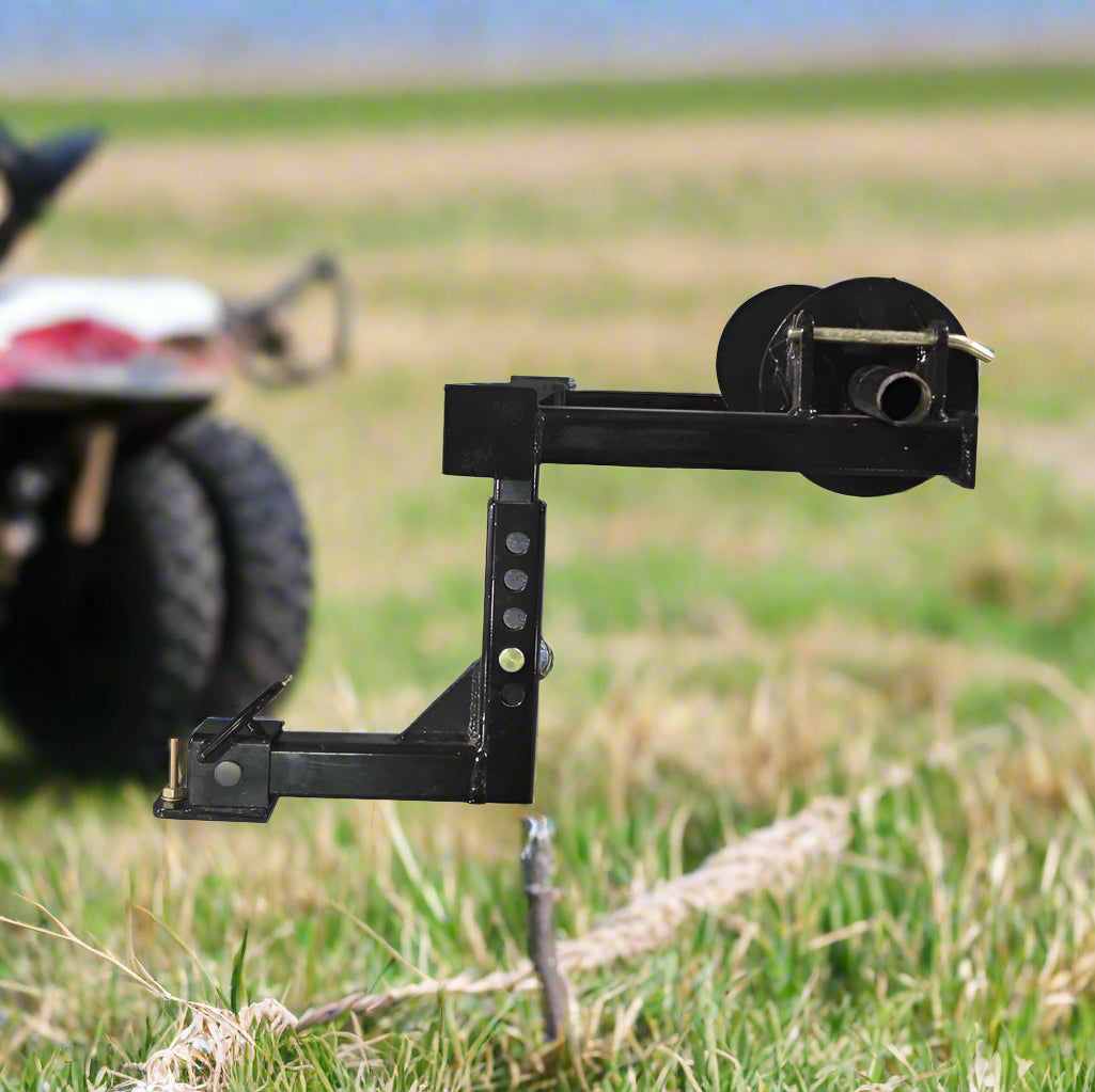 Barbed wire unroller mounted on a hitch
Fence wire roller with ATV adapter
Heavy-duty barbed wire dispenser close-up
Side profile of wire unroller