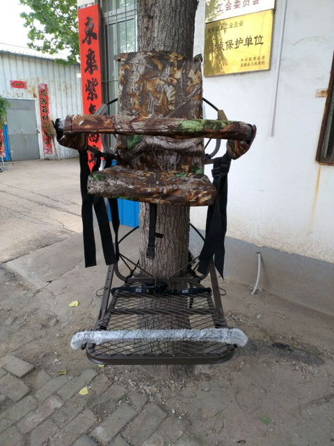 Closed-front hunting deer tree stand with Mossy Oak camo finish
Portable lightweight climbing tree stand for bowhunting
Steel frame deer stand setup on a tree outdoors
Deer stand footrest and seat dimensions close-up
Tree stand frame showing foldable design for easy transport