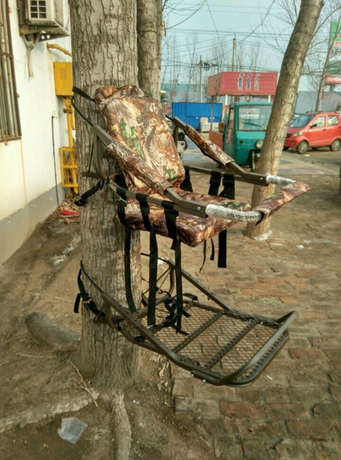 Closed-front hunting deer tree stand with Mossy Oak camo finish
Portable lightweight climbing tree stand for bowhunting
Steel frame deer stand setup on a tree outdoors
Deer stand footrest and seat dimensions close-up
Tree stand frame showing foldable design for easy transport