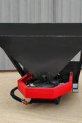 Skid Steer Tilt-N-Scoop Material Spreader front view
Side profile of spreader mounted on skid steer
Hydraulic spreader with sidewalk shield
Top view of hopper and agitator
Spreader attachment in action with sand