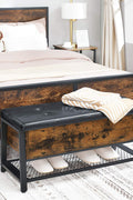 "Industrial Chesterfield-style storage bench ottoman with black metal frame, faux leather tufted top, and hidden trunk storage – Model TSLB2110"