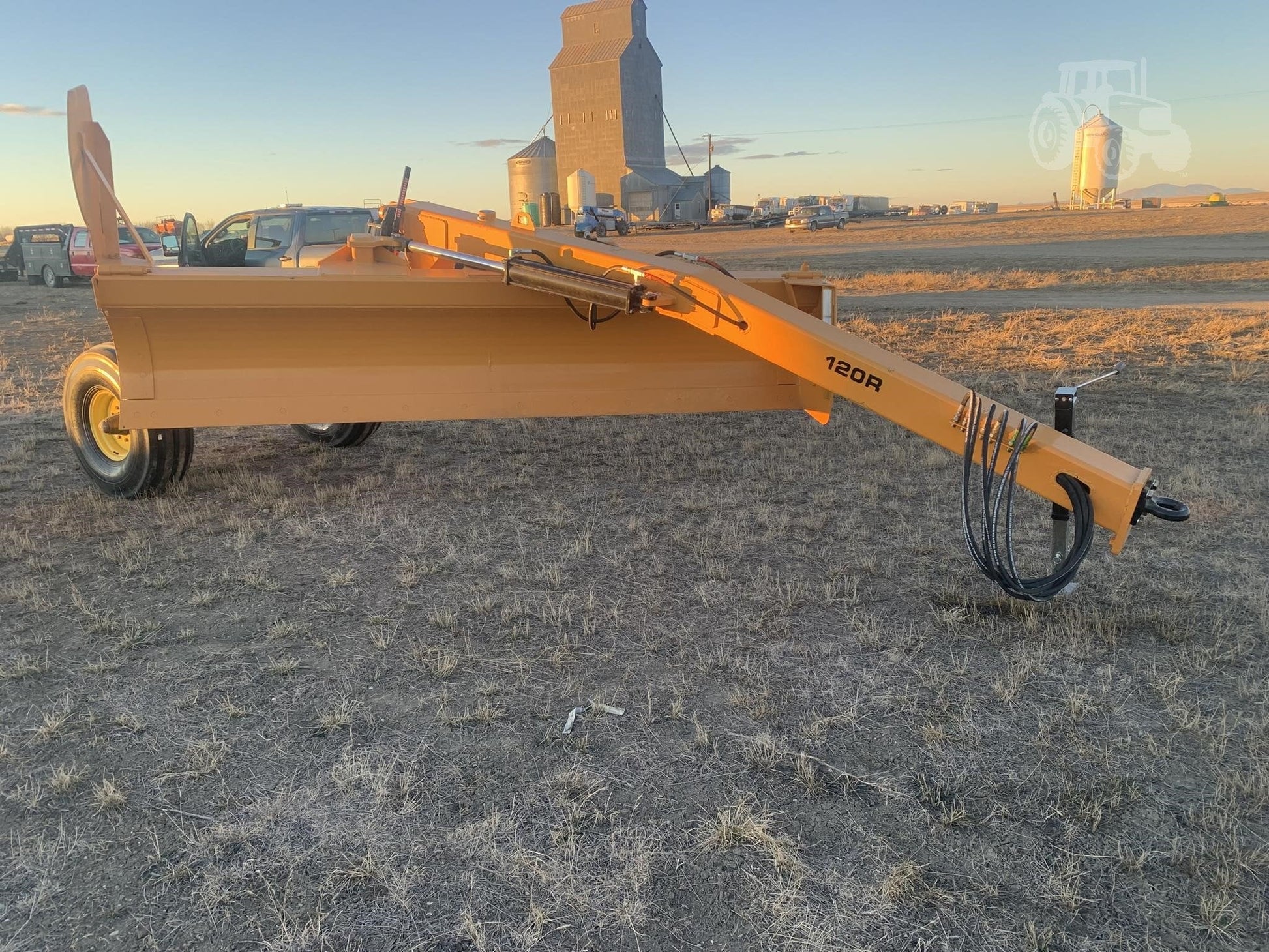 Industries America pull-type 12 FT grader scraper on gravel field
Heavy-duty 14 FT grader scraper with hydraulic control arms
16 FT grader scraper leveling rural construction site
Side view of orange pull-type grader scraper for tractors
Durable steel blade grader scraper with triple reinforced frame