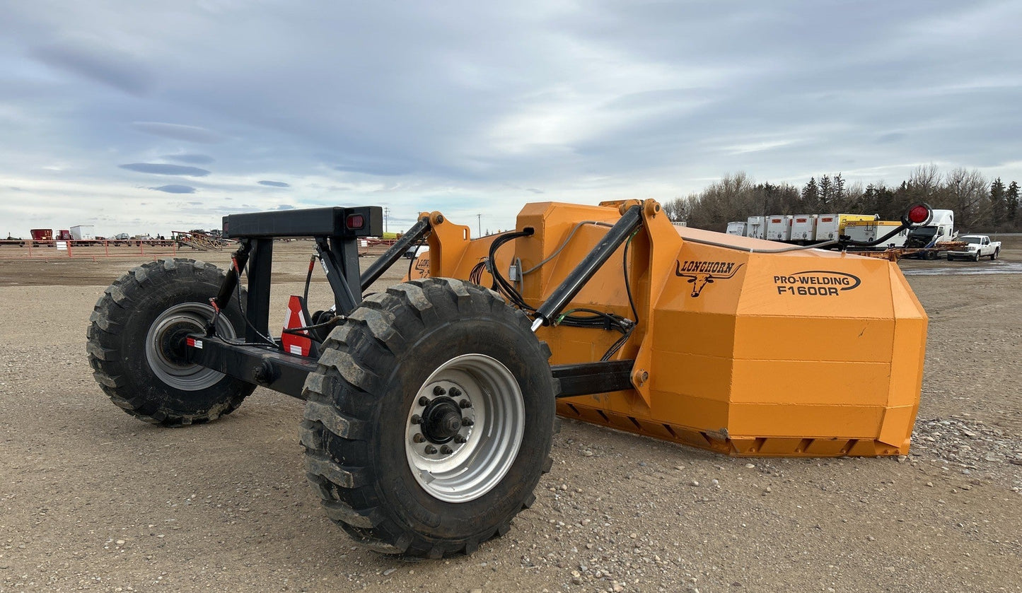 Industries America 16 FT Hydraulic Pull Scraper – Side View on Tractor

Heavy-Duty Orange Scraper with Flotation Tires – Field Ready

16 Foot U-Blade Hydraulic Scraper for Earthmoving Projects

Tractor Attachment Scraper with Tilt Function – Rear Angle View